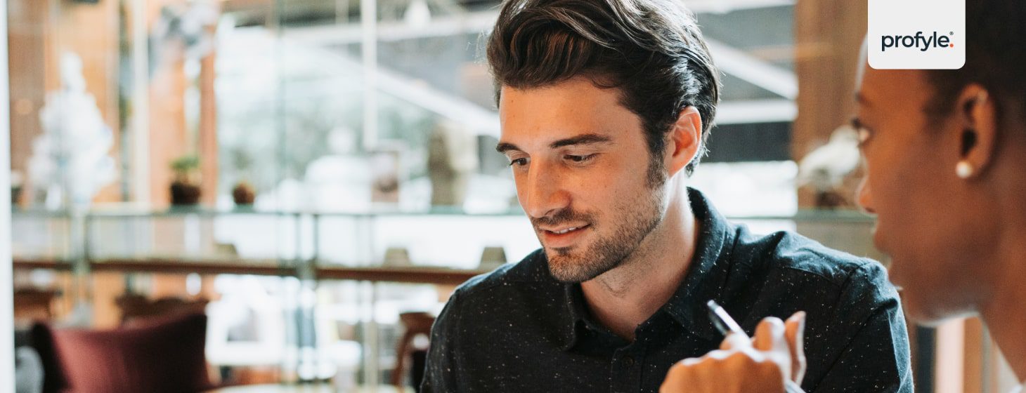 businesspeople sharing a smart business card