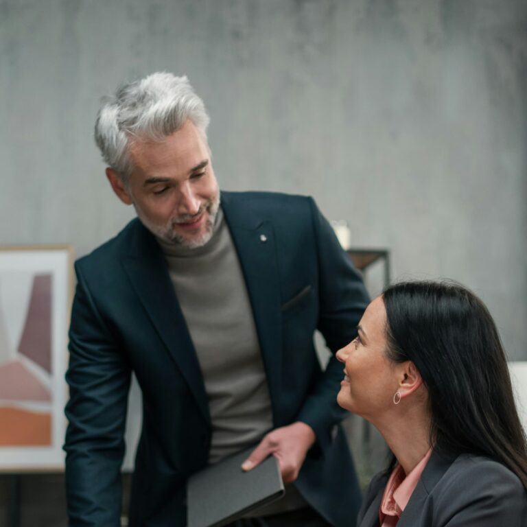 A team at a company discussing digital business cards