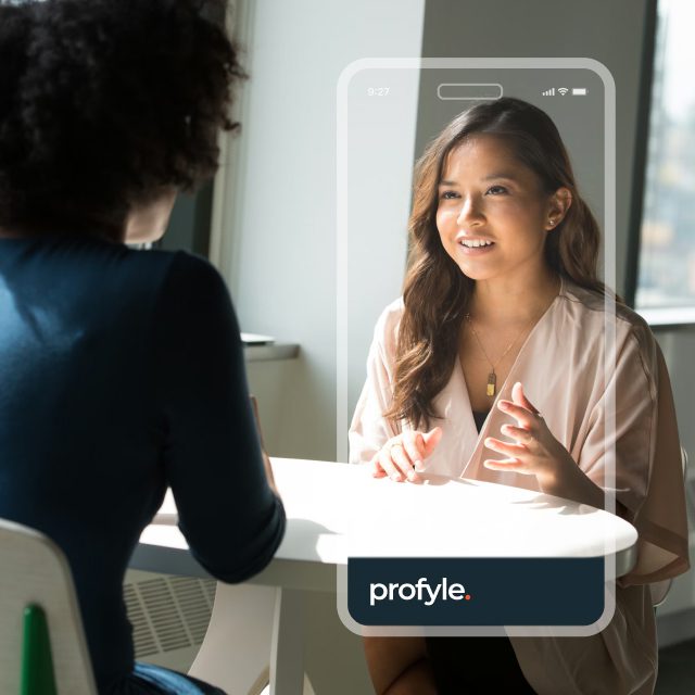 Woman smiling and gesturing during a conversation, framed by a smartphone overlay with 'profyle.' text.